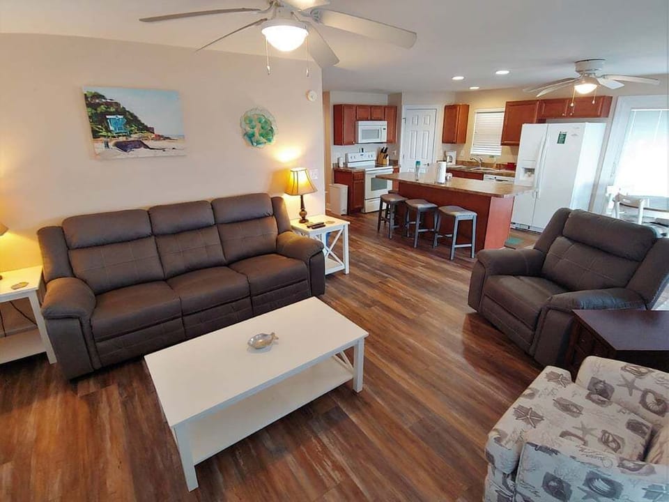 Bright, comfy living space — relax after a full beach day