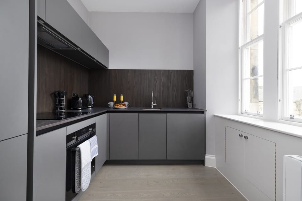 Studio, 1 Bedroom | Private kitchen | Fridge, oven, stovetop, dishwasher