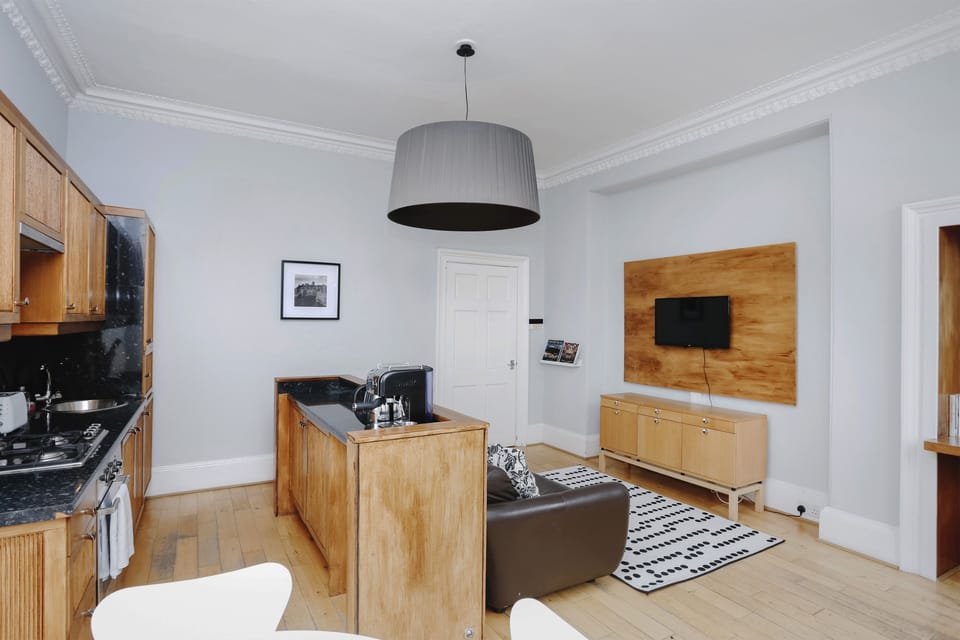 Apartment, 2 Bedrooms, City View | Living area | TV