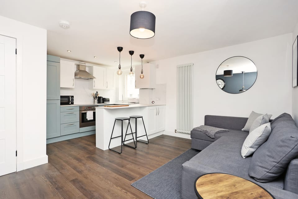 Apartment, 1 Bedroom, Balcony | Living area | TV
