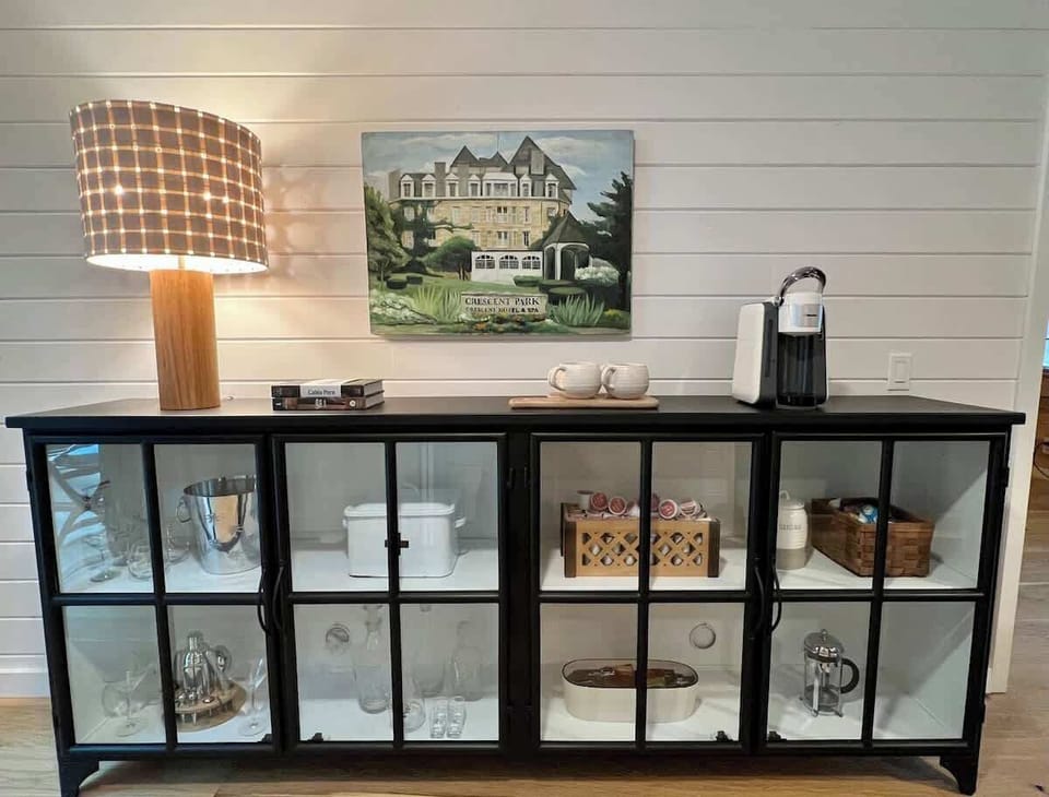 Fully stocked cocktail & coffee bar! Traditional coffee maker, French press, and Keurig machine available. Coffee/tea, K-cups, sugars and creamers are provided.