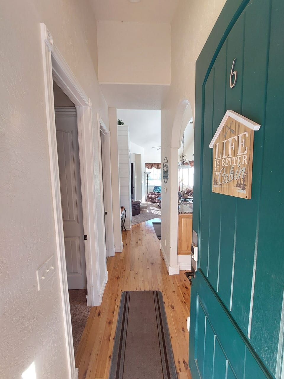Entrance hall that connects the spare bedroom, spare bathroom, & kitchen!