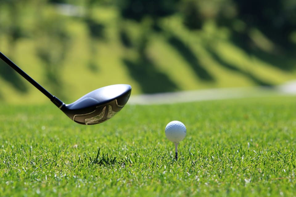 Nearby golf course with manicured greens for a relaxing round.