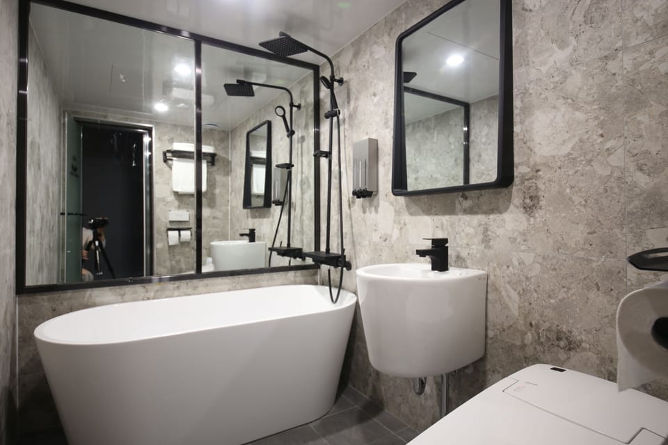 Superior Double Room | Bathroom | Designer toiletries, hair dryer, bathrobes, slippers