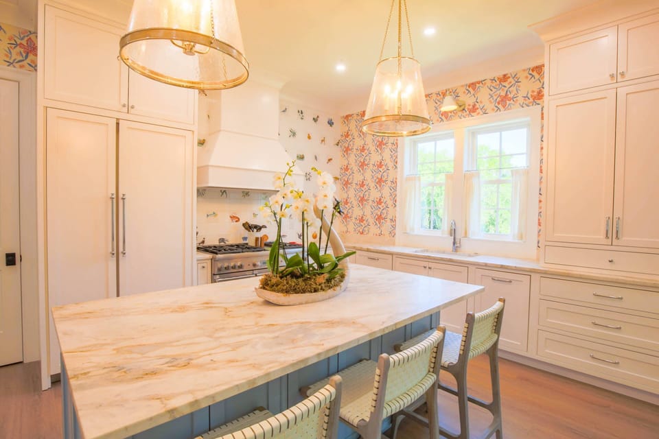 This kitchen features top-of-the-line appliances and custom cabinetry.