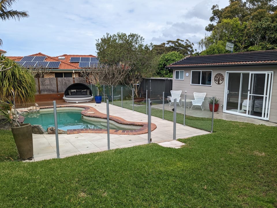 The Pool house overlooking the sparkling saltwater pool & spa!