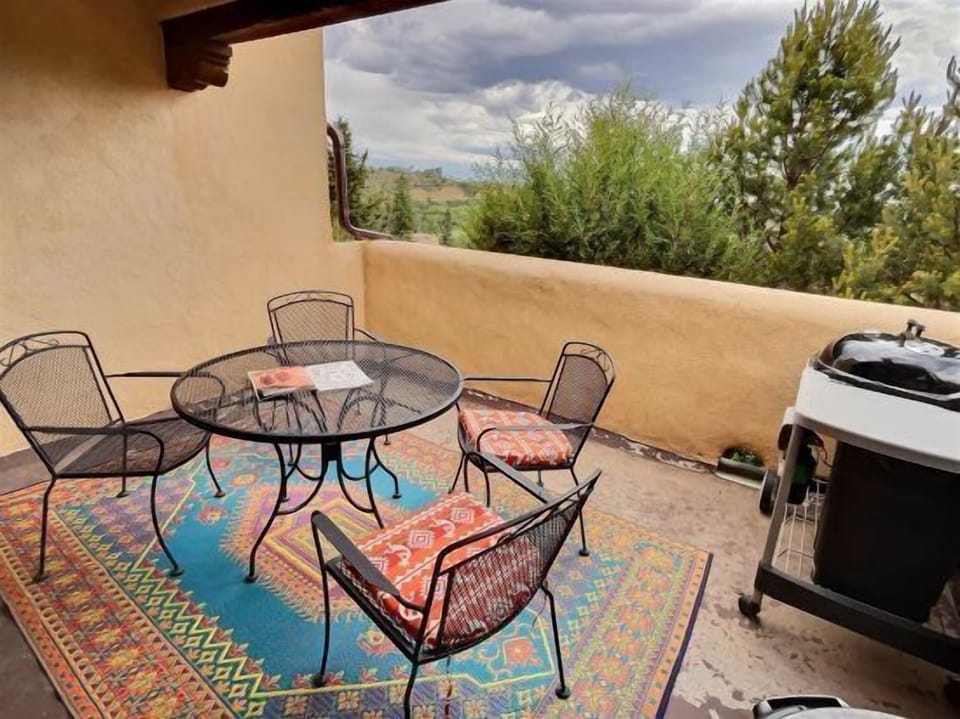 Outdoor dining area on main floor private patio