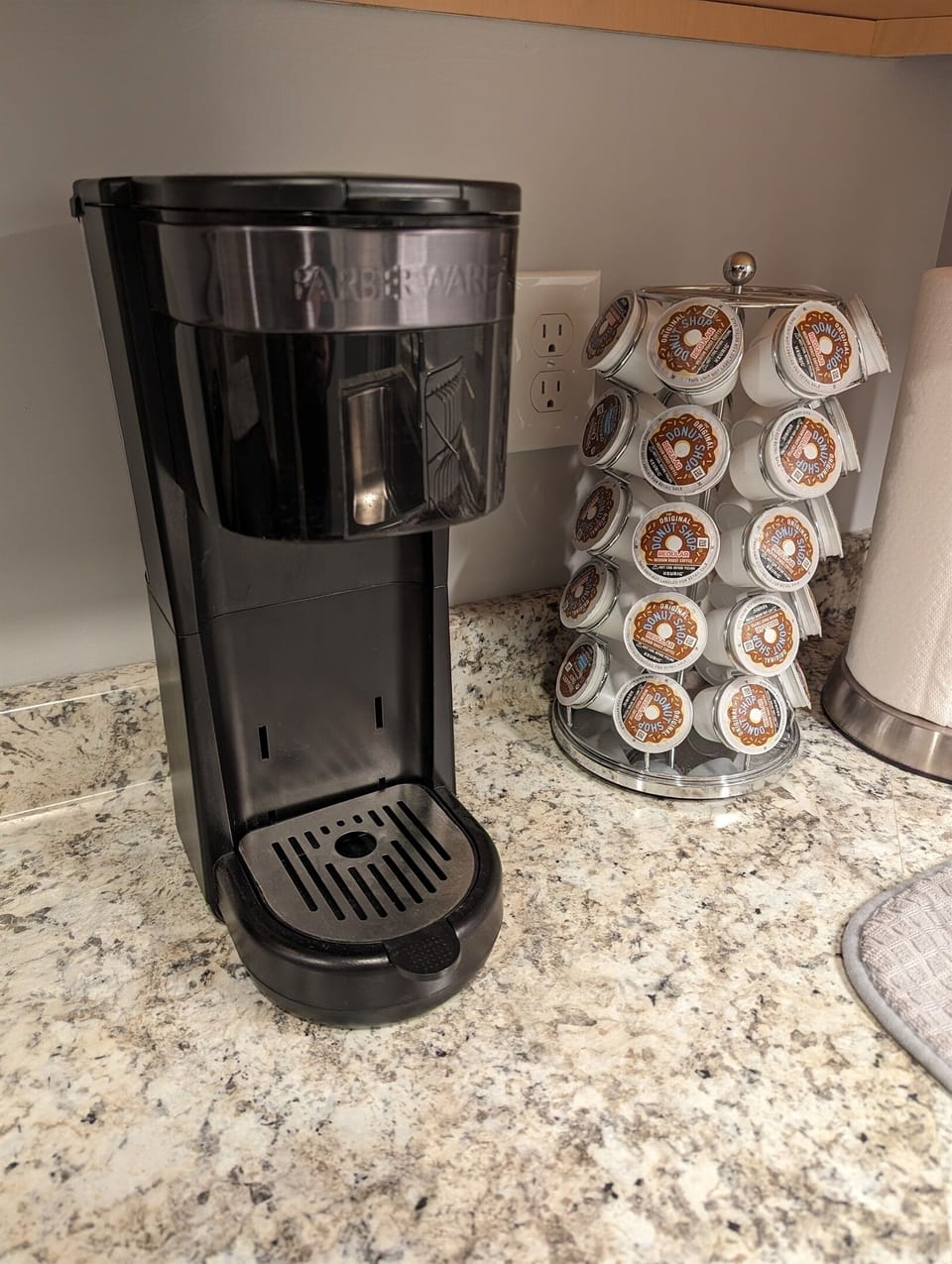 Single-serve coffee brewer accepts K-Cups or grounds (using the supplied basket instead of the K-Cup adapter)