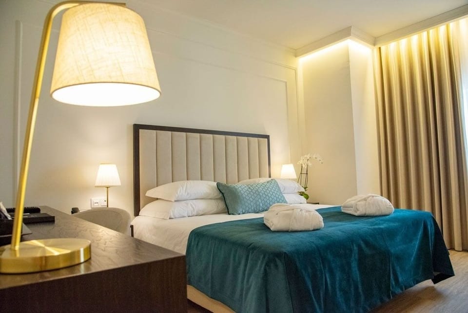 Superior Double or Twin Room | Minibar, desk, laptop workspace, soundproofing