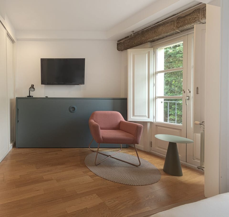 Family Apartment, 2 Bedrooms | Living area | 32-inch plasma TV with digital channels, TV