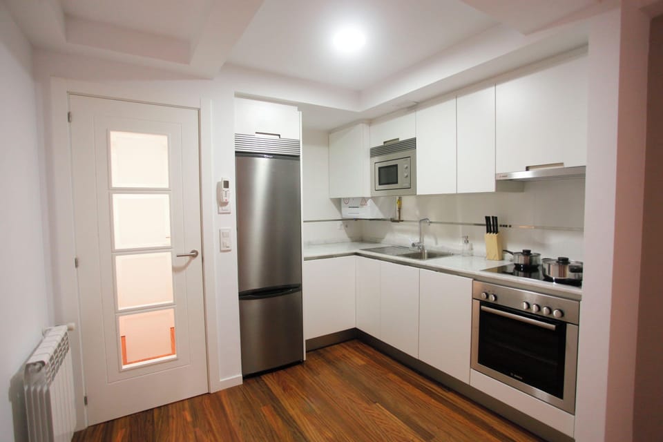 Apartment, 2 Bedrooms (Galo - Private Garden) | Private kitchen | Full-size fridge, microwave, oven, dishwasher