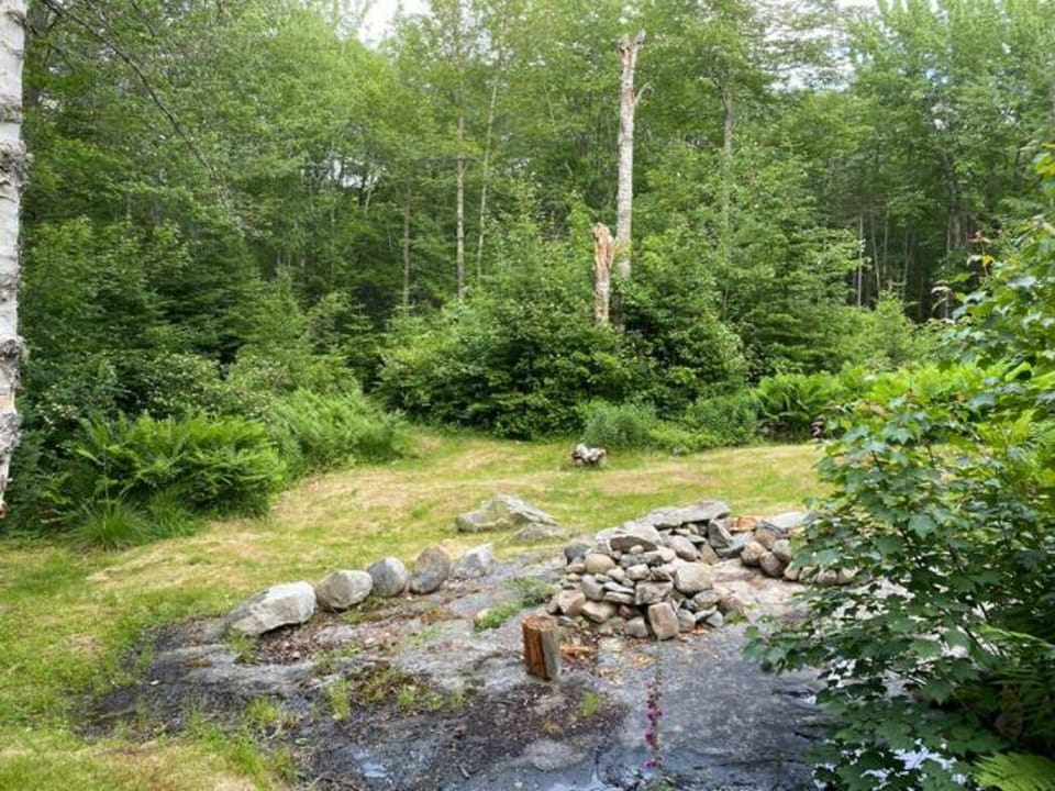 Trail head in the backyard  leads to bay water