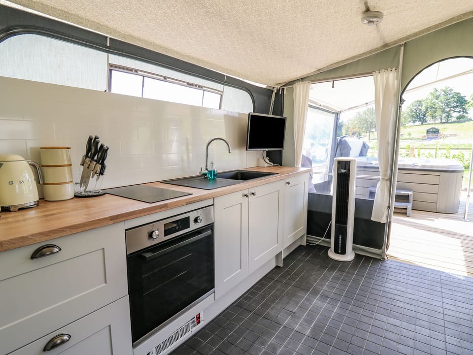 Fridge, electric kettle, toaster, cookware/dishes/utensils