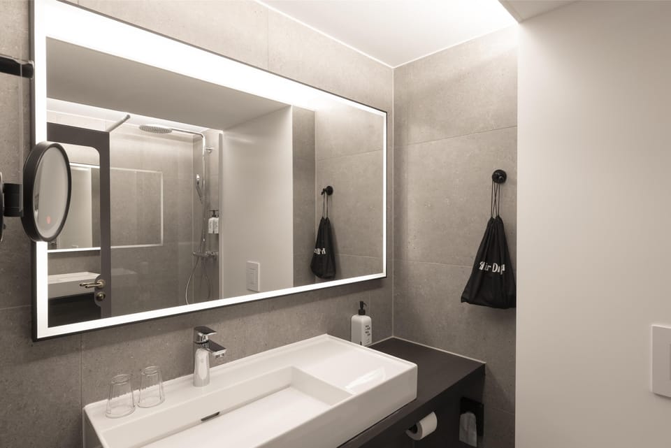 Family Three | Bathroom | Shower, rainfall showerhead, hair dryer, towels