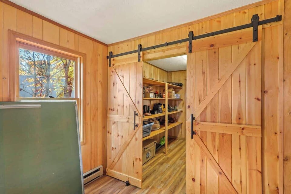 Ample storage solutions seamlessly integrate into the design, ensuring a clutter-free and organized living space.