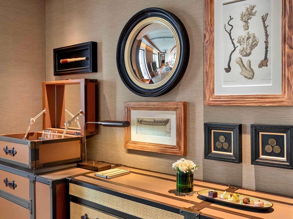Suite, 1 King Bed, Sea View | Minibar, in-room safe, soundproofing, iron/ironing board