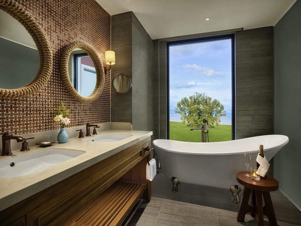 Suite, 1 King Bed, Sea View | Minibar, in-room safe, soundproofing, iron/ironing board