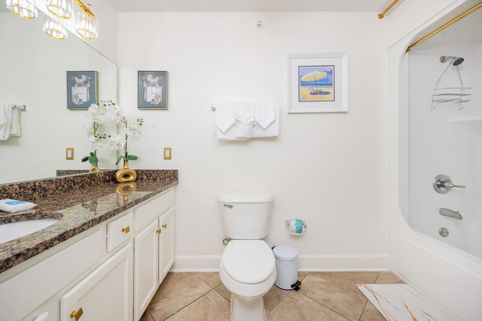 Embrace relaxation in this guest bath, where thoughtful details enhance your morning routine
