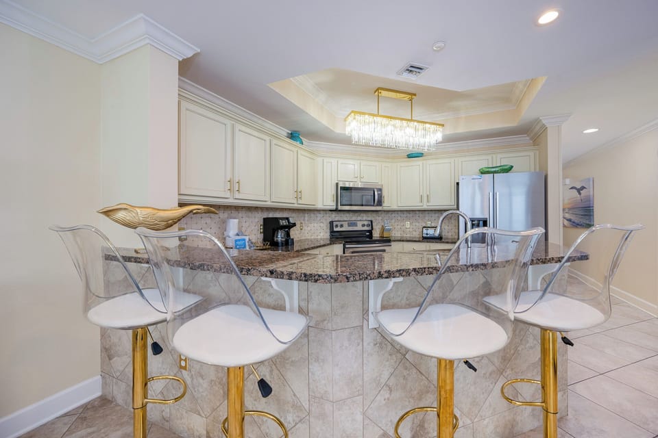 Gather at the stylish bar stools, enjoying laughter and conversation while sipping your favorite drinks