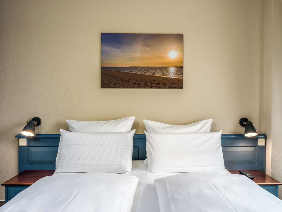 Hypo-allergenic bedding, minibar, in-room safe, desk