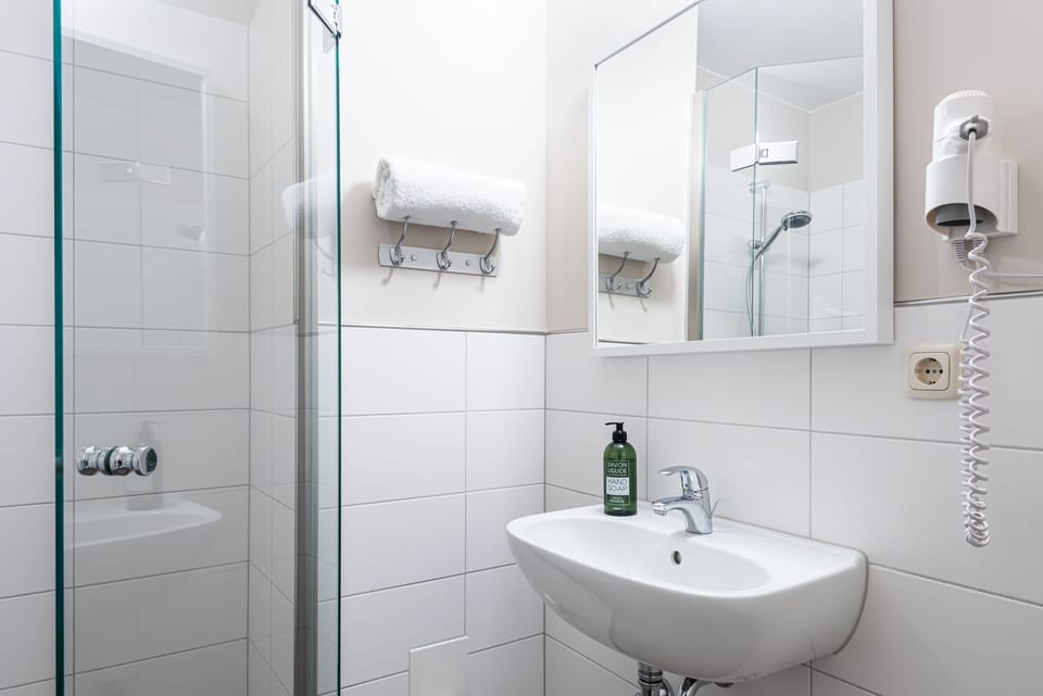 Shower, rainfall showerhead, hair dryer, soap