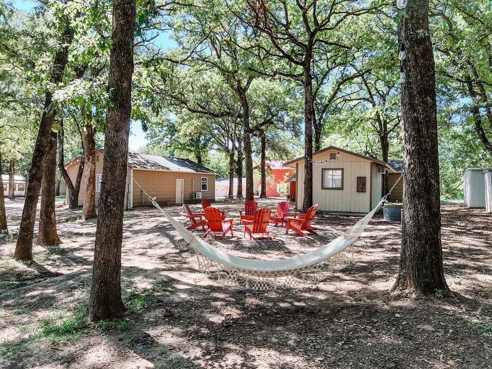 Time for a relaxing nap on the hammock under the trees. 