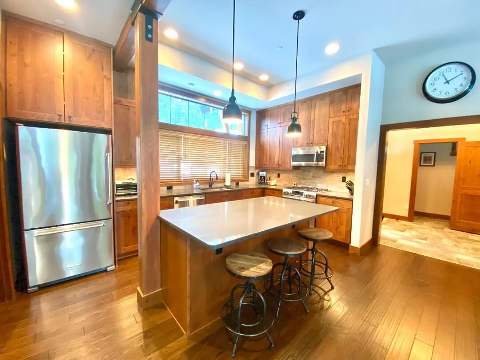 Fully stocked kitchen with stainless appliance