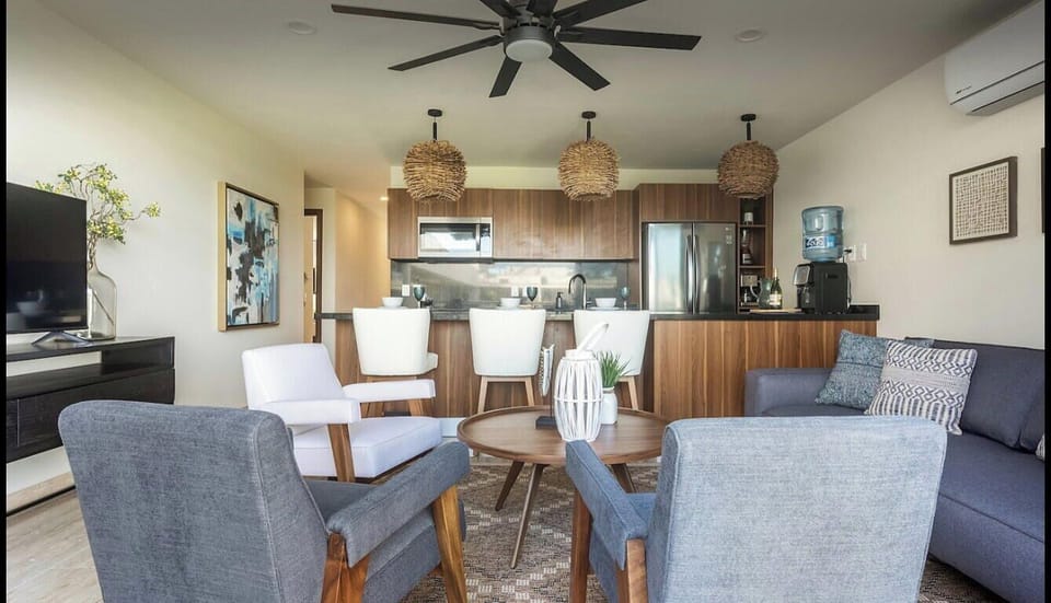 Bright open living and dining space designed for time together.
