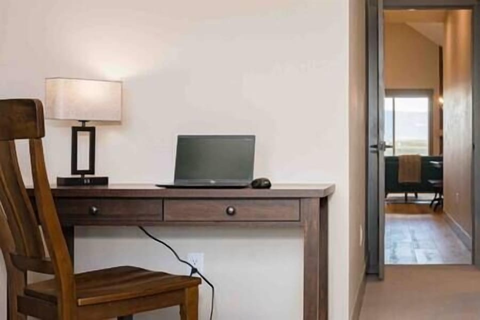 A desk with fast internet access for virtual work and connection! 