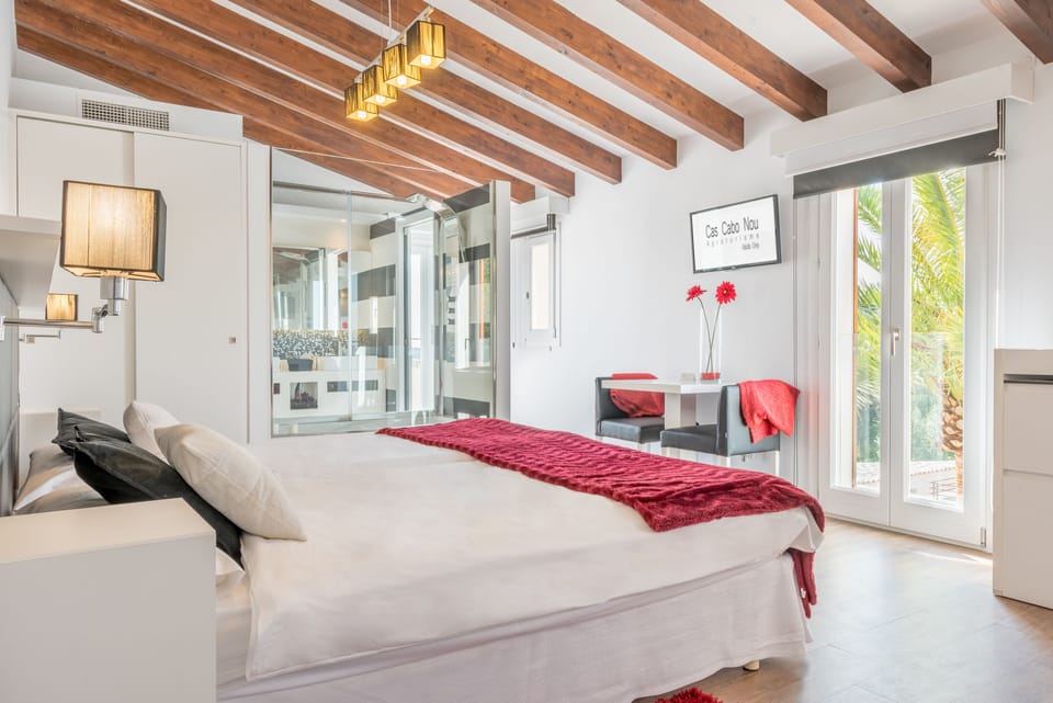 Junior Suite, 1 King Bed | Minibar, in-room safe, individually decorated, individually furnished