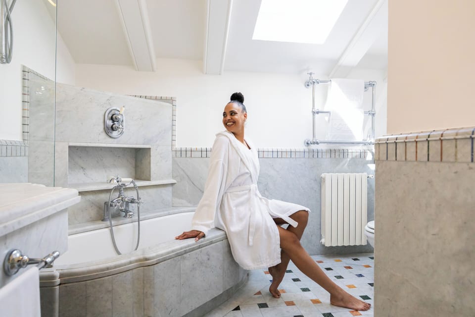 Romantic Duplex | Bathroom | Eco-friendly toiletries, hair dryer, bathrobes, slippers