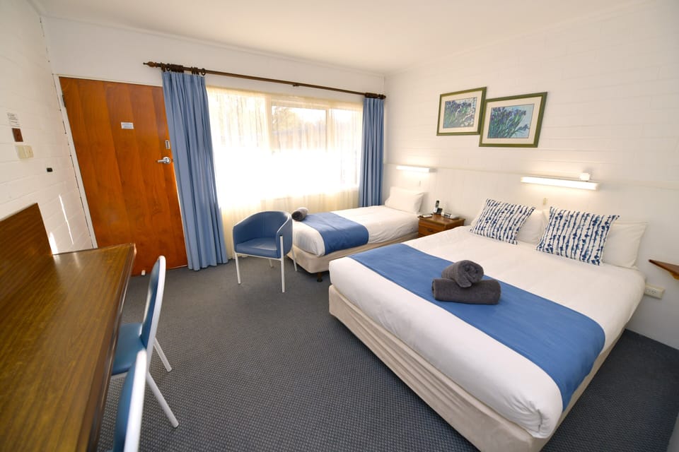 Deluxe Triple Room, Garden View | Free WiFi, bed sheets