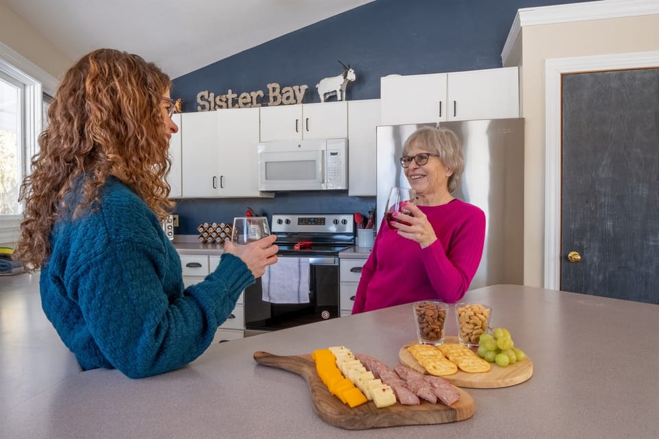 Pour, sip, and savor—our cozy kitchen is the perfect spot to wind down.