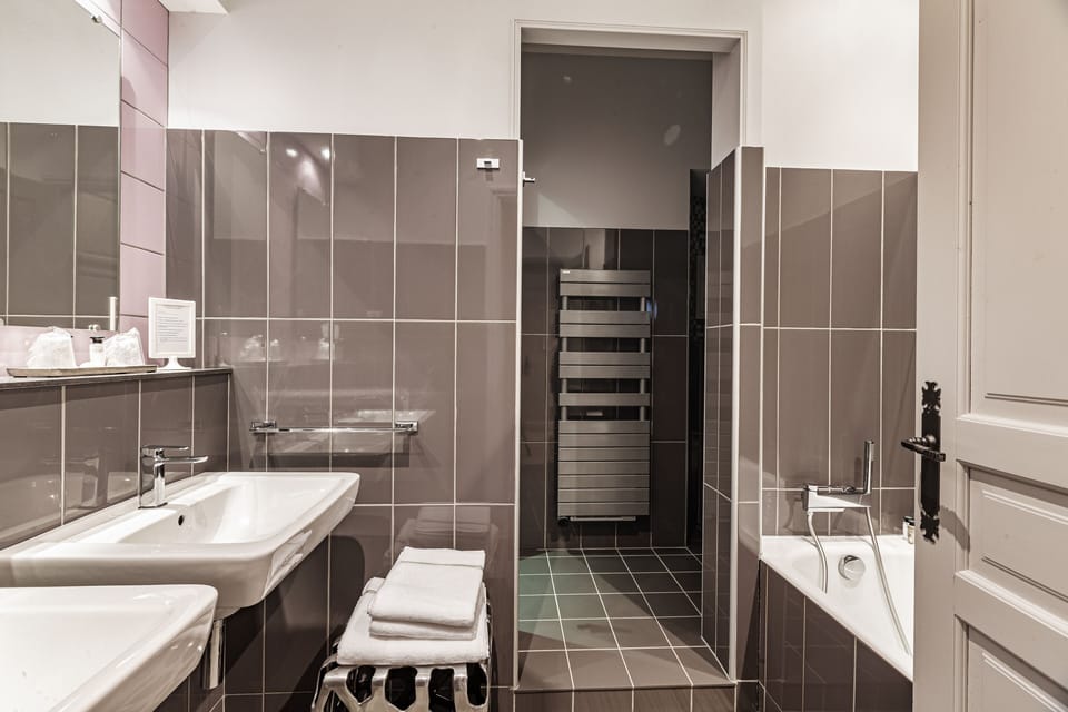 Family Quadruple Room, 2 Bedrooms, Garden View | Bathroom | Free toiletries, hair dryer, towels, soap