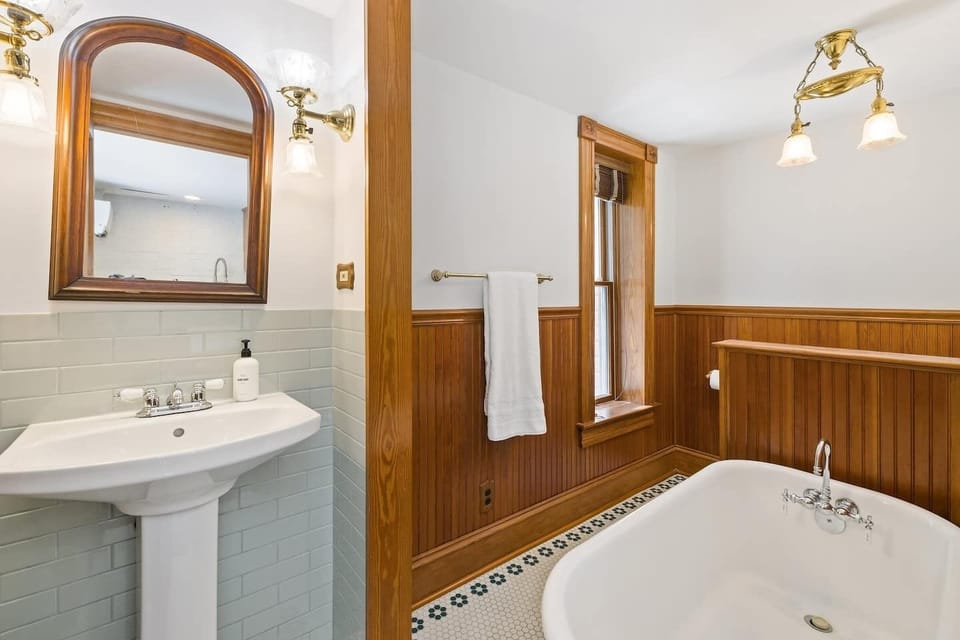 Bathroom #1: main floor, bathtub without a shower