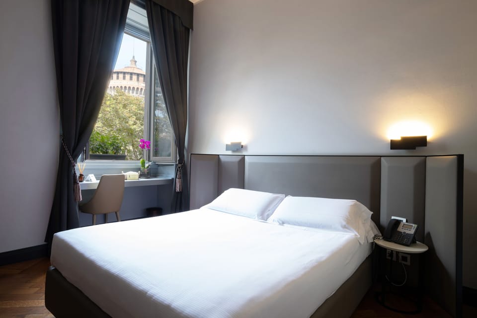 Down comforters, free minibar, in-room safe, individually decorated