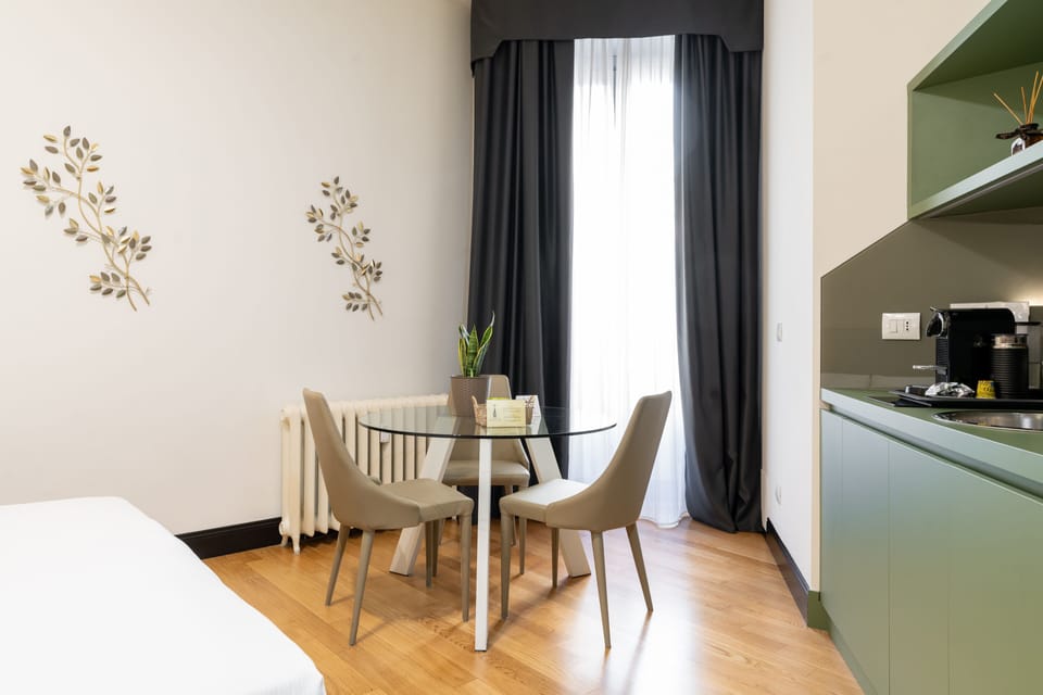 Superior Suite | Living area | 40-inch flat-screen TV with digital channels, TV