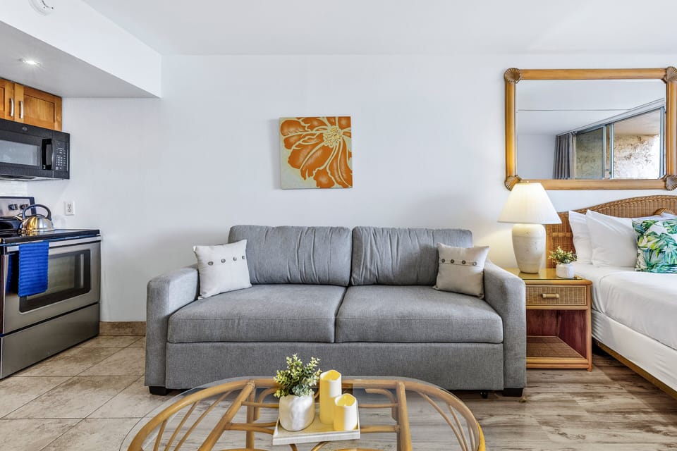 Plush sleeper sofa provides additional space for guests.