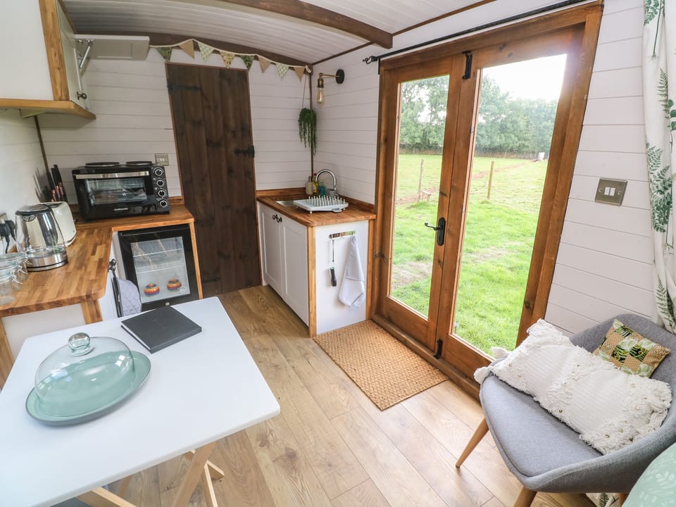 Fridge, electric kettle, toaster, cookware/dishes/utensils