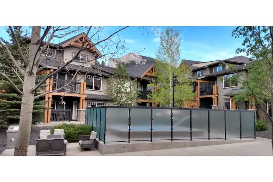 View of courtyard, fire pit area and hot tub from our bedroom and patio.
