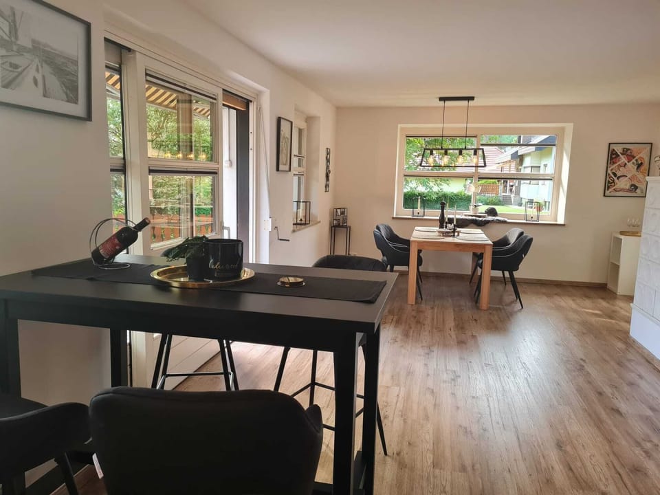 Deluxe Condo | Living area | 32-inch flat-screen TV with satellite channels, TV