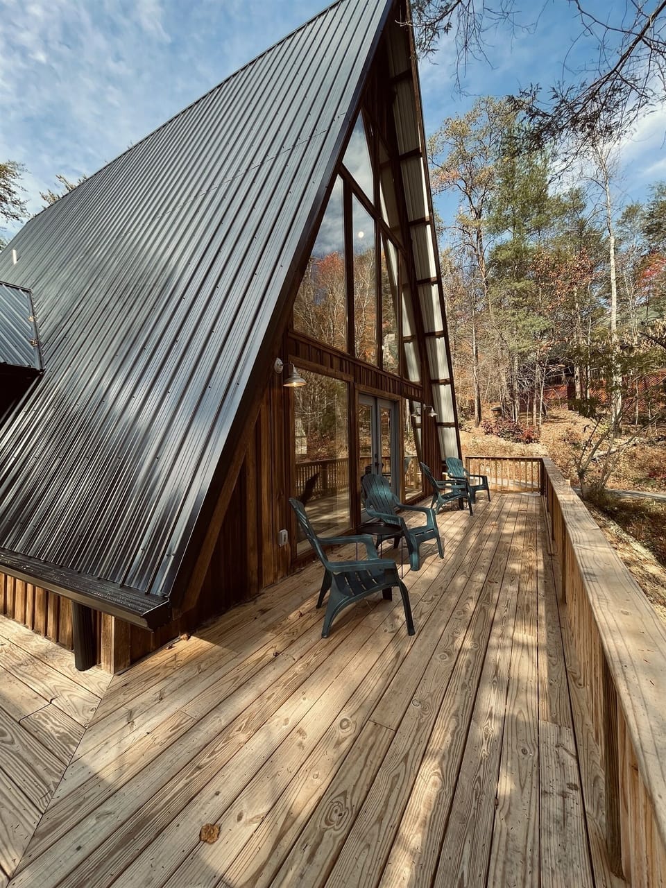 Walk into the cabin and step out into nature on the main level wrap around porch.