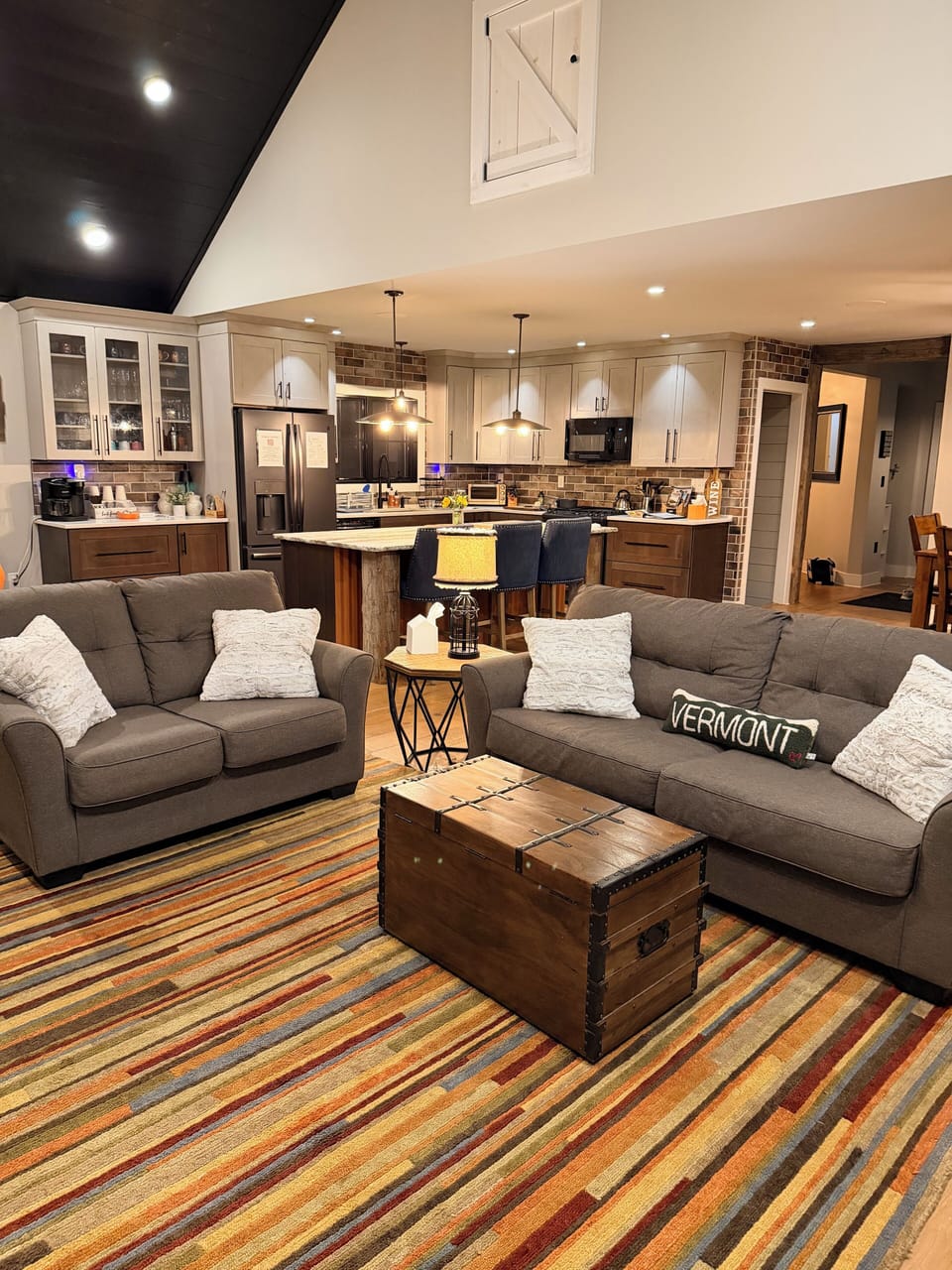 Open floor plan - living room, kitchen & dining area