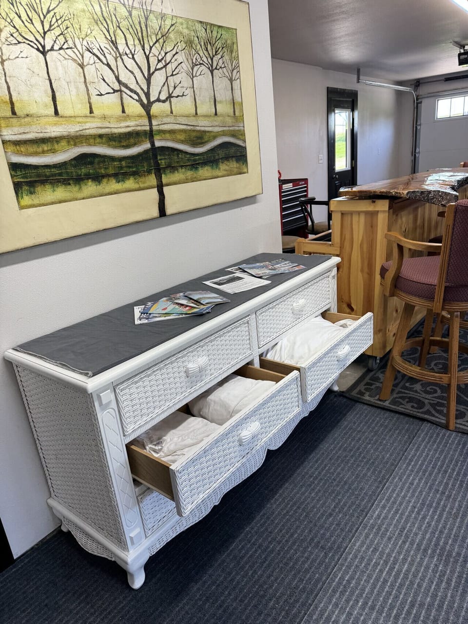 Everything you need for the futon is in the garage dresser: sheets, blankets, and pillows ready to go.