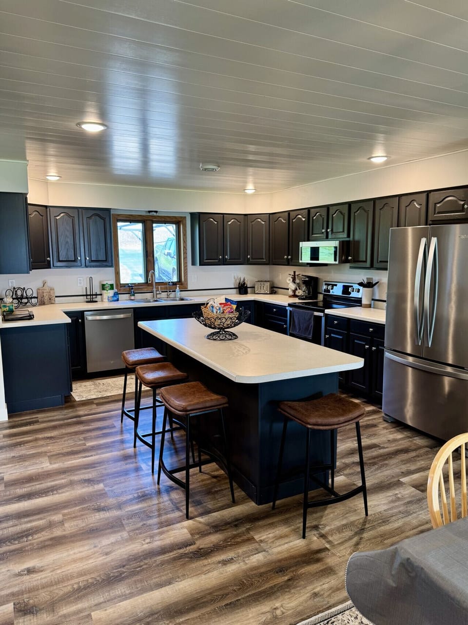 Big kitchen, plenty of counter space, stainless appliances & all the essentials