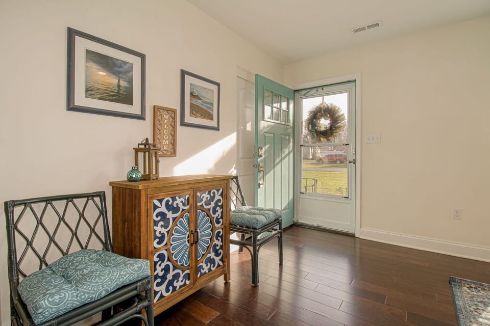 Our front door is open for you. There's a highchair, booster seat, and umbrellas in the coat closet.