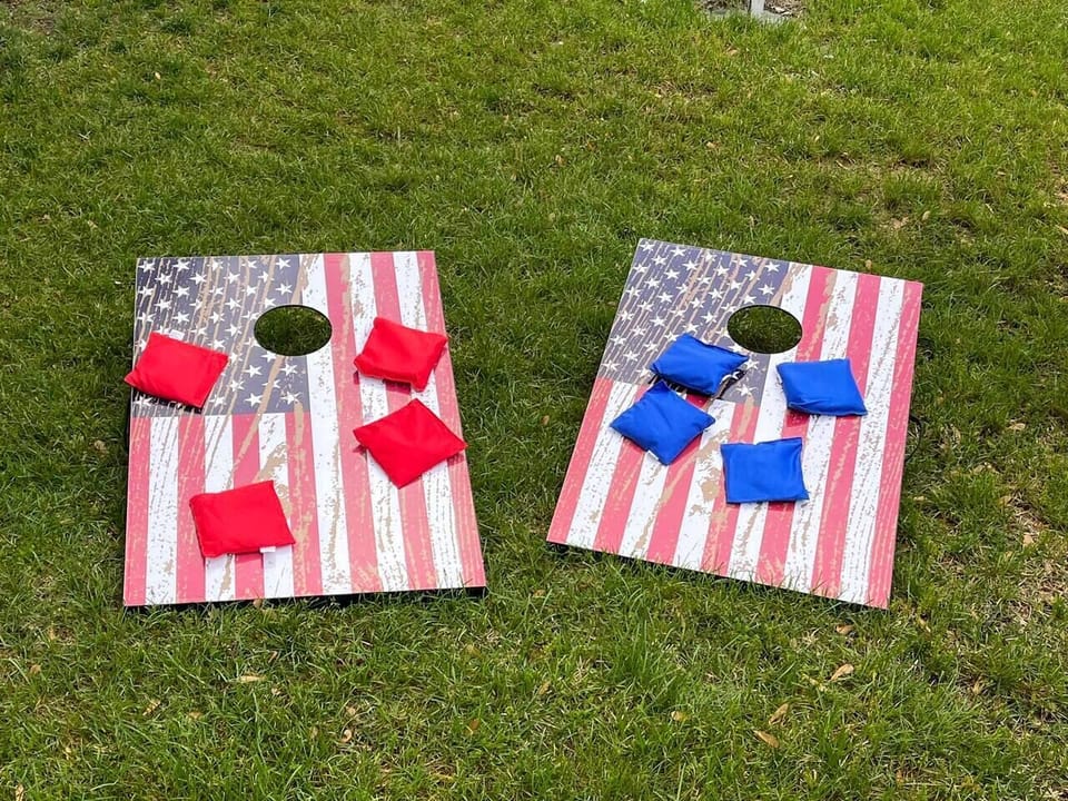 Play some cornhole in the backyard.
