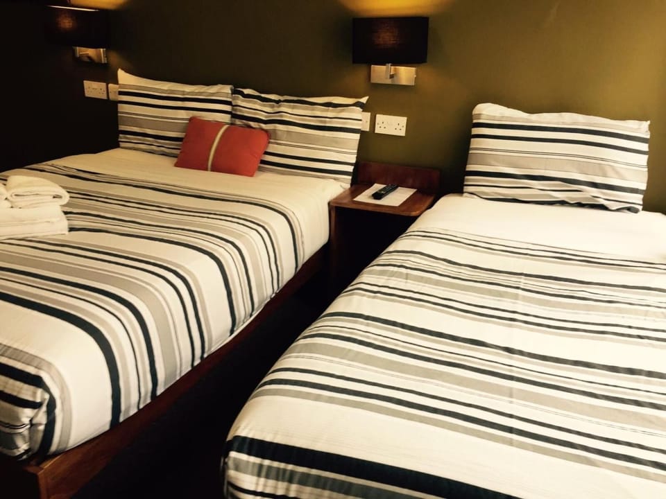 Blackout drapes, iron/ironing board, free WiFi, bed sheets