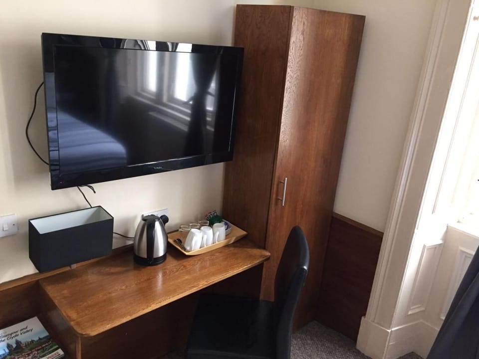 Blackout drapes, iron/ironing board, free WiFi, bed sheets