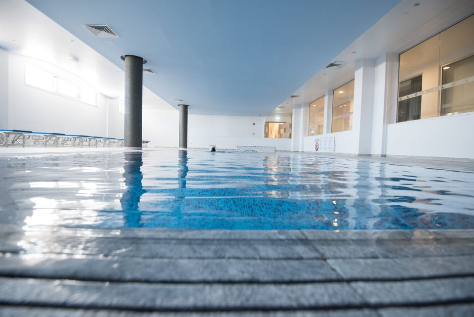 Indoor pool, seasonal outdoor pool, pool umbrellas, sun loungers